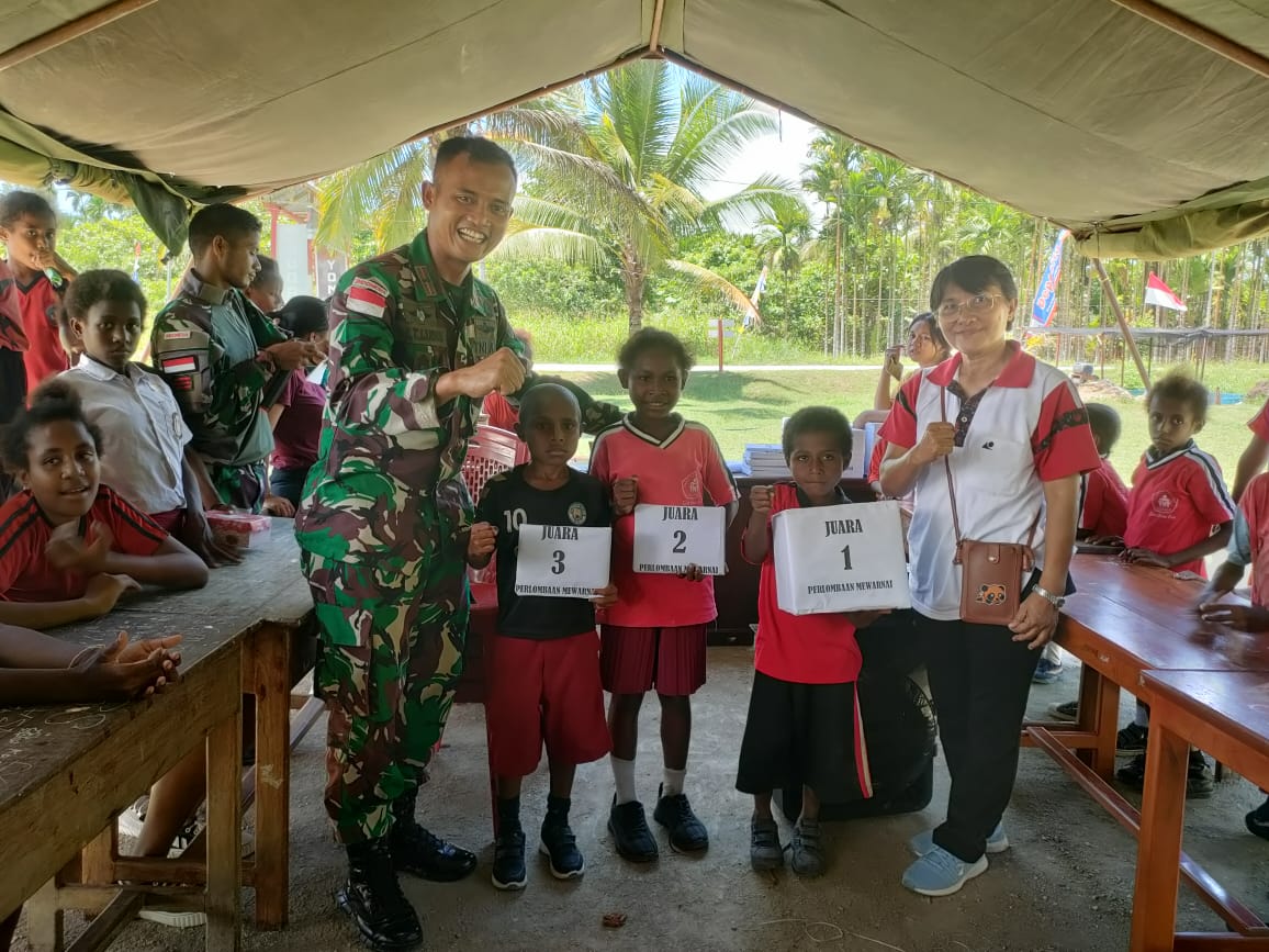 MERIAHKAN HUT YONIF 122/TOMBAK SAKTI KE- 59 TAHUN SATGAS POS MOSSO GELAR LOMBA MEWARNAI UNTUK SD NEGERI MOSSO