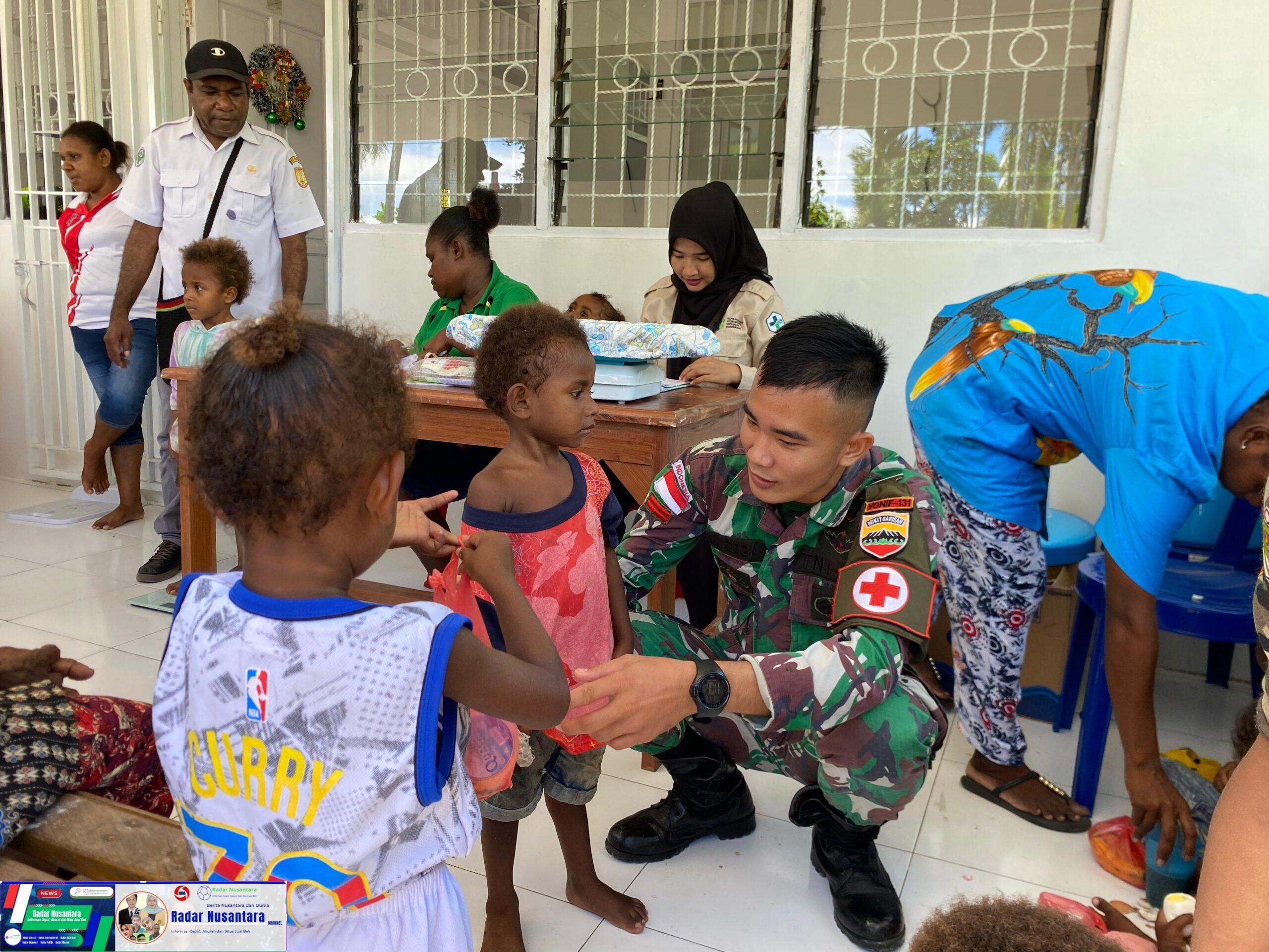 Wujudkan Anak-anak Papua Sehat dan Kuat, Satgas Yonif 131/Brajasakti Bersama Puskesmas Model Gelar Pelayanan Posyandu di Kampung Mosso